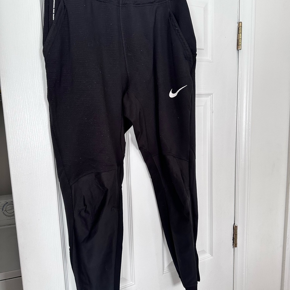 Nike Black Pants with White Swoosh two pairs